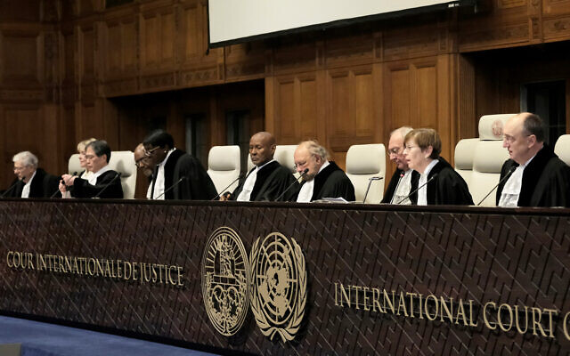 Judges preside over the opening of the hearings at the International Court of Justice in The Hague, Netherlands, January 11, 2024. (AP Photo/Patrick Post)